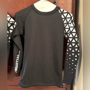 Xmartial matching rash guard and spats. Worn once. Both size Medium
